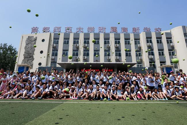 中网球童暨中网小画家选拔走进北京市育新学校