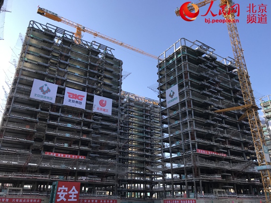 北京冬奥村项目主体结构全部封顶 赛后将作为人才公租房