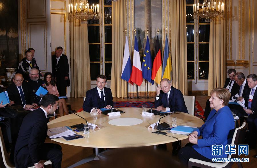 　12月9日，在法国巴黎，（从左到右）乌克兰总统泽连斯基、法国总统马克龙、俄罗斯总统普京和德国总理默克尔出席“诺曼底模式”四国峰会。 .jpg