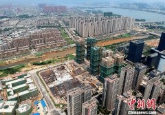 报告：去年百强房企市场份额升至61.5% 负债水平