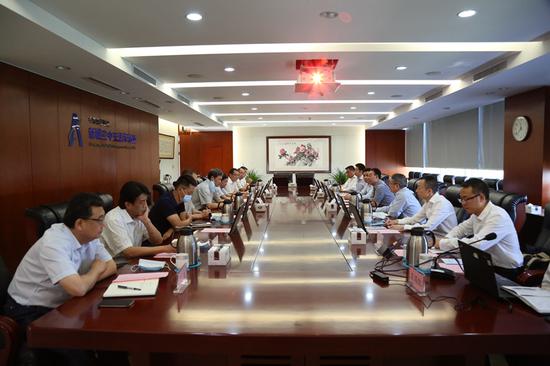 新疆空管局与民航二所开展业务交流会