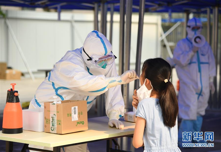构筑守护城市、守护生命的坚强防线——北京开展大规模核酸检测